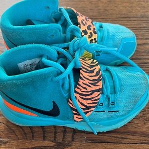Kyrie mid sneakers good condition for girl or boy.